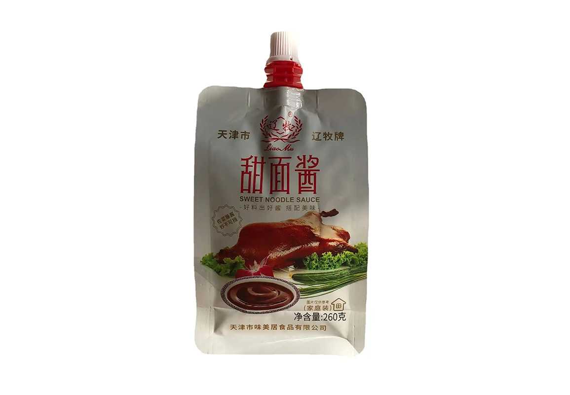 甜面醬包裝革新者 —— 全自動(dòng)自立吸嘴袋灌裝旋蓋機(jī)，高效賦能食品工廠量產(chǎn)
